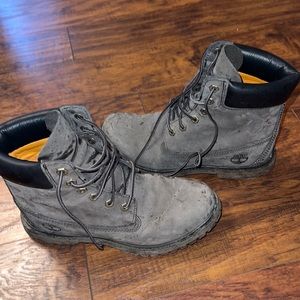 Gray and black Timberland boots